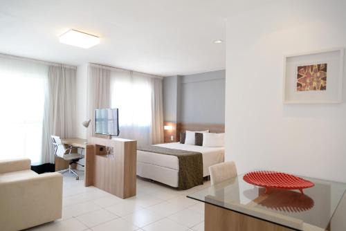 Verano Stay Flat com cozinha, garagem e wi-fi 400 MB Barra Olímpica