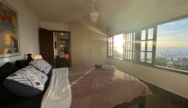 Wall to wall windows with views across the ocean, just 5 minute walk to the beach in a safe location