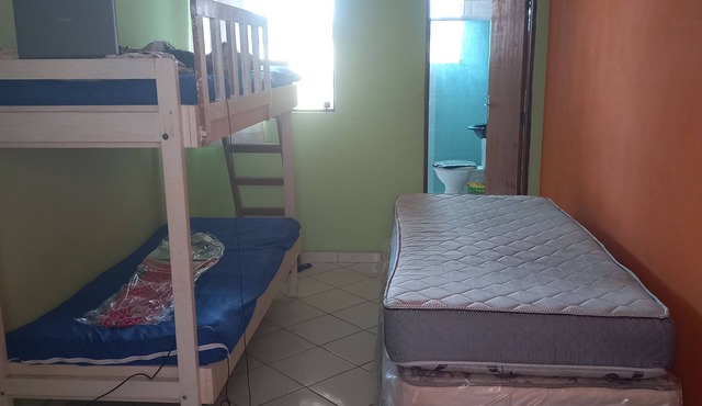 Well ventilated house, semi-detached, in Vila Loty, in Itanhaém, CLOSE TO THE BEACH