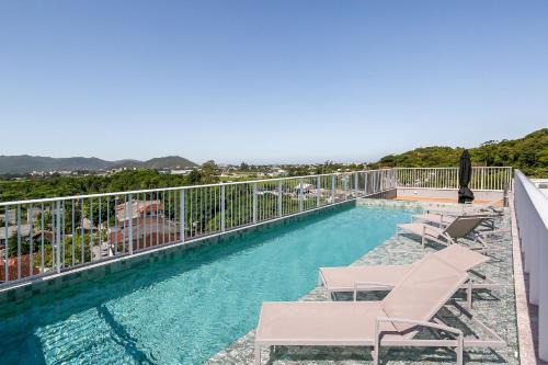 With a beautiful view and a pool near the beaches and airport