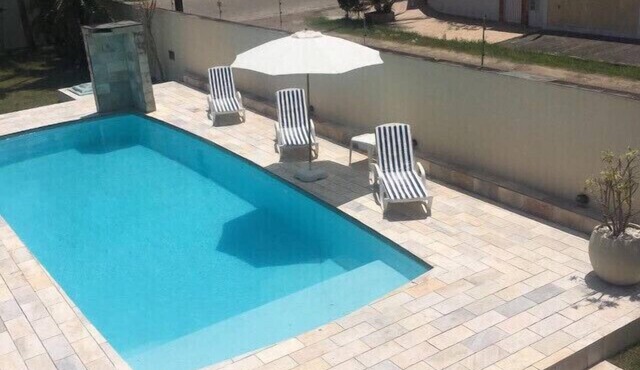 Wonderful Itanhaém with a huge swimming pool, billiards, Wi-Fi, Sky TV, lawn, and alarm system.