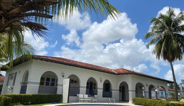Your family vacation paradise with pool, palm trees and garden